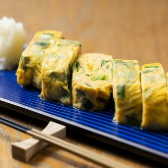 Takeda eggs and chive greens rolled in dashi stock