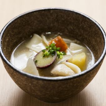 Dumpling soup with plenty of root vegetables