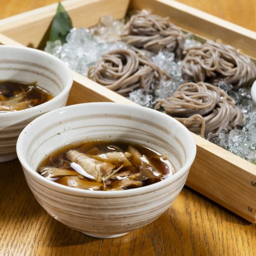 Rich mushroom dipping soba noodles with soup made with Beppu Sakura hot spring water