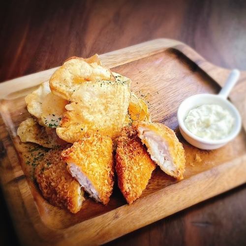 Fish and freshly fried potato chips with smoked daikon radish tartar sauce