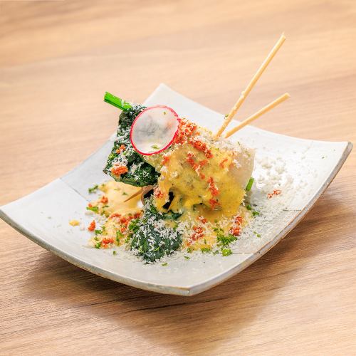 Spinach rolls with carbonara and parmesan cheese