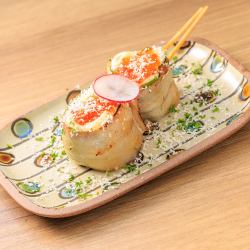 Bell pepper rolls with creamy cheese and salmon roe