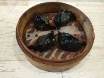 black steamed dumplings