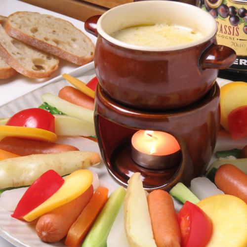 Bagna cauda with vegetables and cheese