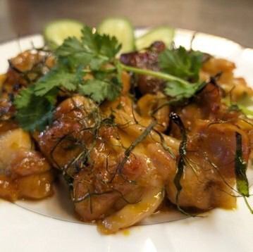 Grilled chicken with lemon leaves