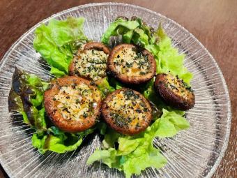 Charcoal-grilled shiitake mushrooms with parsley butter