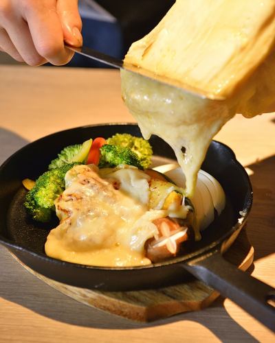 Steamed vegetables with raclette cheese