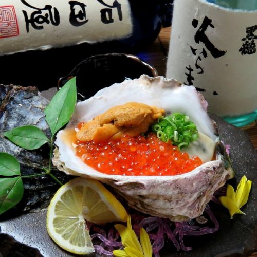 1 piece of raw oysters topped with sea urchin