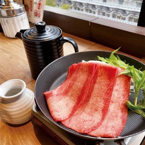 鉄板 牛タン 特製タレ焼き(玉ねぎテンコ盛り付き)