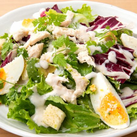 Caesar salad with chicken and egg