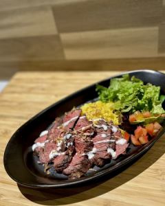 beef steak over rice