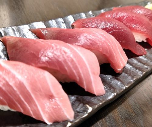 Comparison of bluefin tuna medium fatty tuna and red meat nigiri sushi (six pieces)