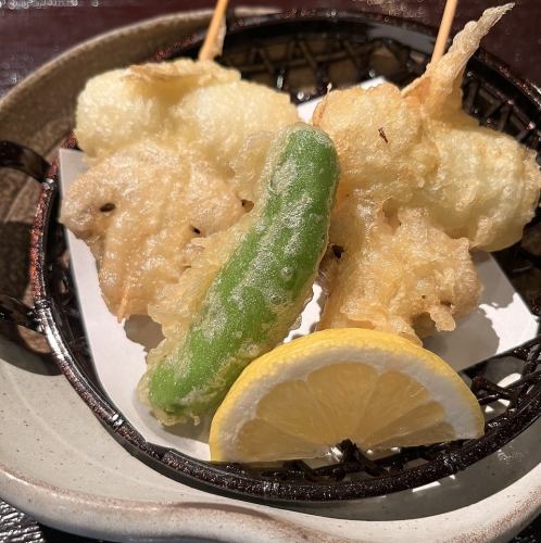 Tempura skewers of flounder and mushrooms wrapped in asparagus