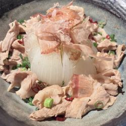 Steamed whole new onions