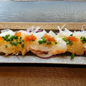 Red sea bream sashimi served with olive oil