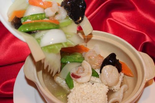Steamed rice with seafood and vegetables