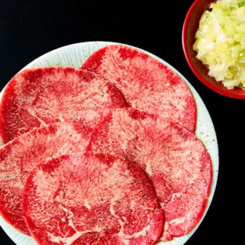 Marbled tongue with green onions and salt
