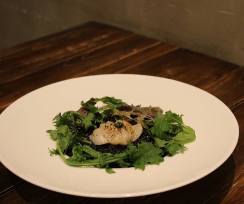 Grilled scallops with squid risotto