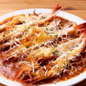 Charcoal-grilled giant shrimp topped with tomato sauce fresh pasta