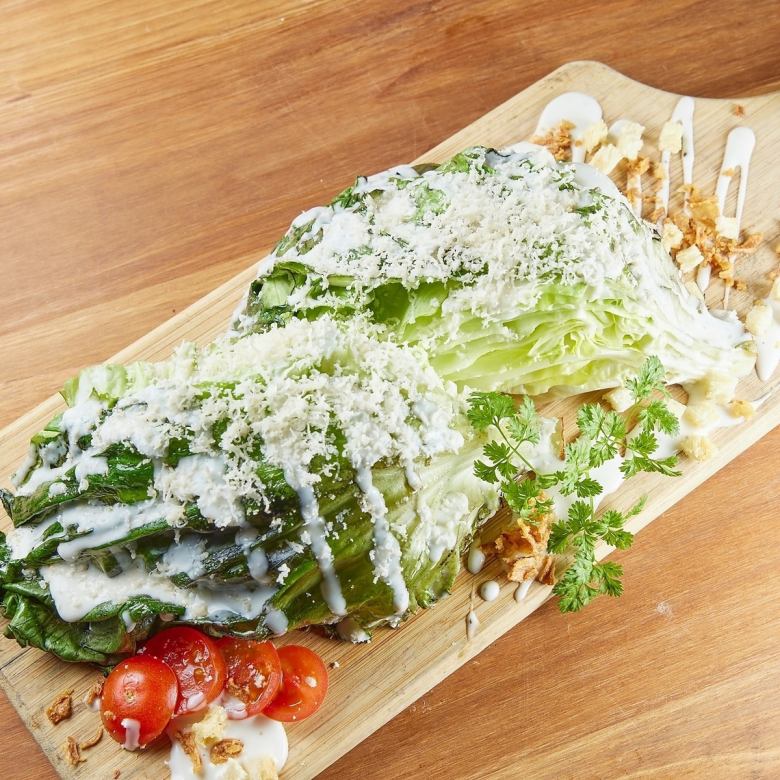 Caesar salad with chargrilled lettuce and freshly shaved cheese
