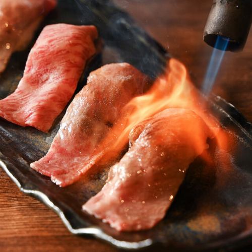 Broiled Omi beef nigiri sushi
