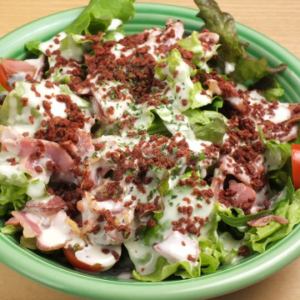 Homemade horse bacon Caesar salad