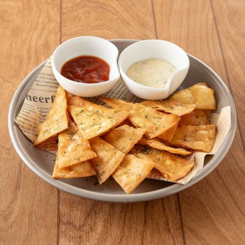 Tortilla chips with two dips