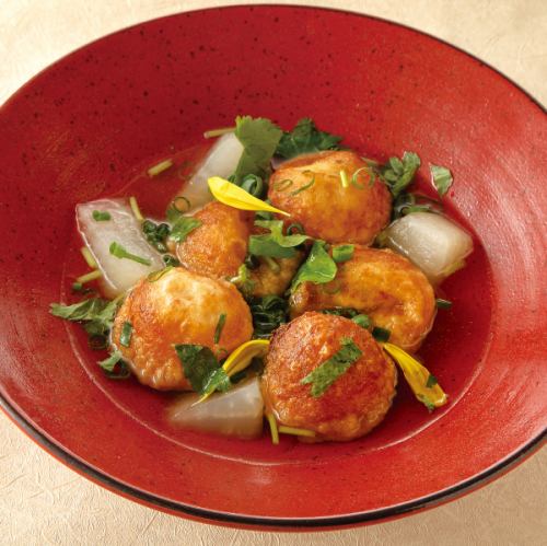 Deep-fried takoyaki served with dashi stock