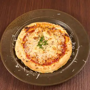 ズワイガニのパルマ風ピッツア