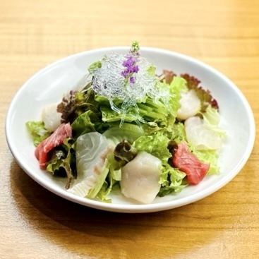 Colorful seafood salad with crab miso dressing