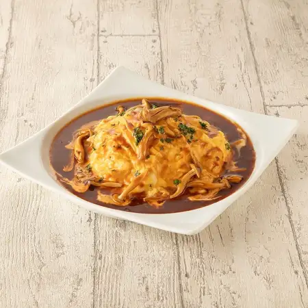Garlic omelet rice with runny eggs and demi-glace sauce