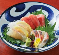 Assortment of three fresh fish sashimi