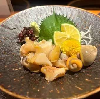 Live whelk sashimi