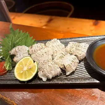 Seared conger eel sashimi