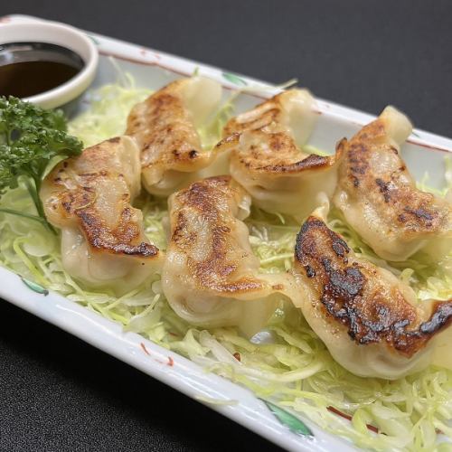 Black pork dumplings (6 pieces)