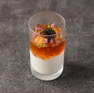 Rice bavarois with sea urchin and caviar, served with consommé jelly.