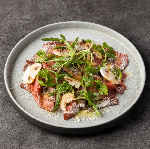 Wagyu Beef Carpaccio with Truffle Dressing