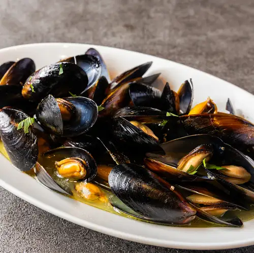 Steamed mussels in white wine, Sardinian style.