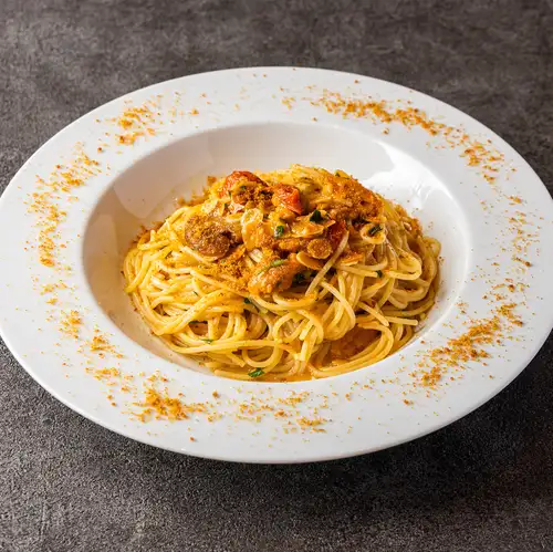 Peperoncino with sea urchin, bottarga, and homemade sun-dried tomatoes