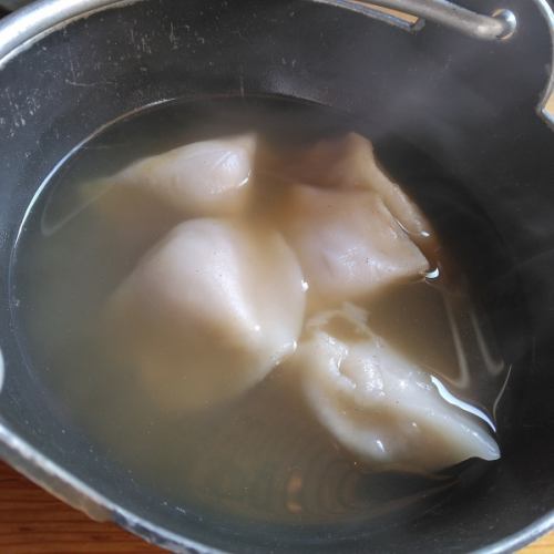 Boiled gyoza with oden soup