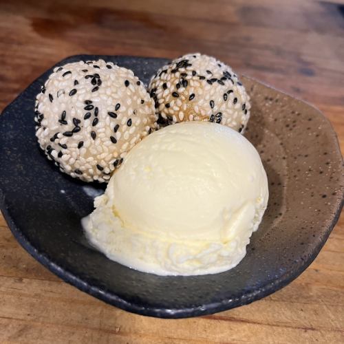 Black sesame dumplings and vanilla ice cream with brown sugar syrup