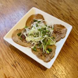 Seared green onion and pork chashu