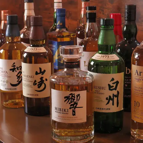 [Bar time featuring craft beers and rare whiskies]