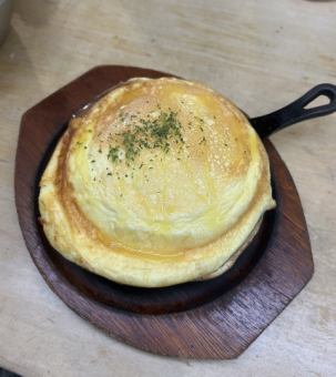 The melted cheese is superb."Cheese Potato Tamagoyaki" served on a hot iron plate