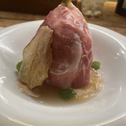 La France pear stuffed with stracciatella, French prosciutto, cinnamon and clove pear puree