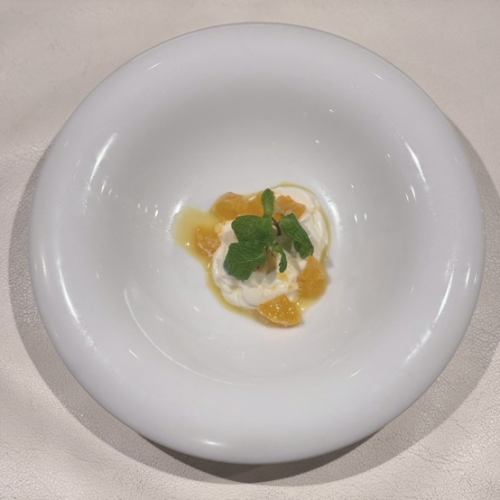 Osmanthus and yogurt panna cotta with Unshu mandarin orange sauce