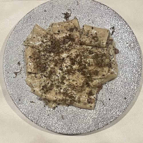 Guanciale and mushroom paste carbonara with Italian truffles and paccheri