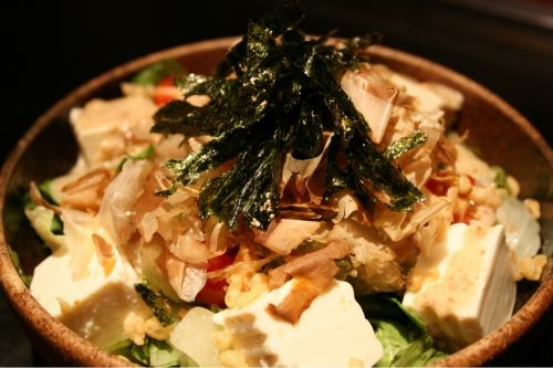 Spicy sesame salad with tofu and kimchi