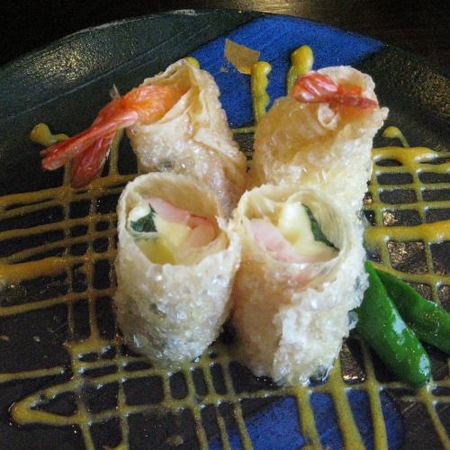 Deep-fried shrimp and cheese wrapped in yuba with egg yolk vinegar sauce