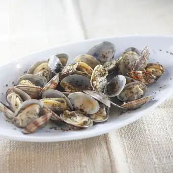 Clams sautéed in butter with basil